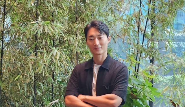 Ddoddunam poses for a photo ahead of an interview with The Korea Herald at the Grand Central building in Seoul on Aug. 14. (Choi Si-young/The Korea Herald)