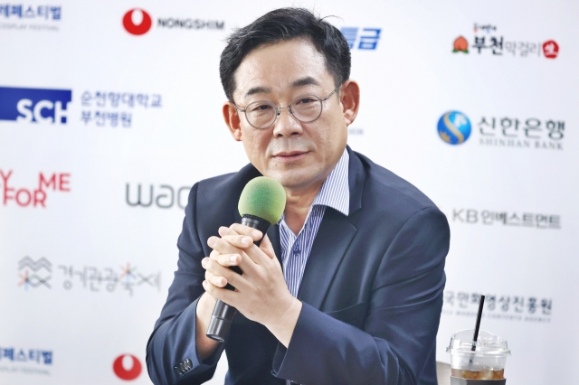 Korea Manhwa Contents Agency President Shin Jong-cheol speaks during a press conference held in Jung-gu, central Seoul on Tuesday. (Yonhap)